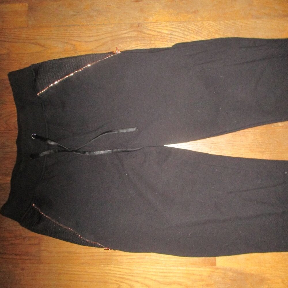 Lime and vine sweat pants with fancy zippe3rs and fancy sides small worn once